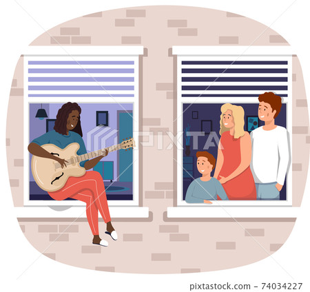 African American woman on balcony plays guitar. Person sings song to guy. Family listens to music African American woman on balcony plays guitar. Person sings song to guy. Family listens to music 74034227