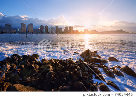 sunrise over Honolulu skyline, Oahu, Hawaii sunrise over Honolulu skyline, Oahu, Hawaii 74034446