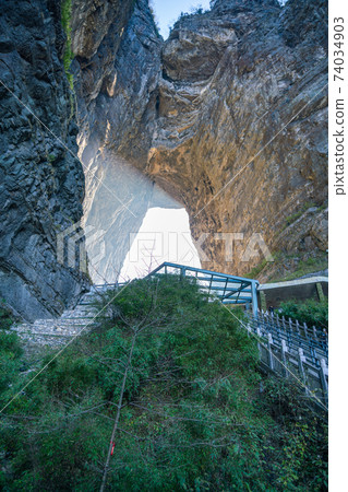 Vertical photo of Heaven's Gate rock in Tianmen mountain 74034903