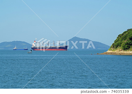 View of a cargo ship moored off the coast of Mizushima View of a cargo ship moored off the coast of Mizushima 74035339