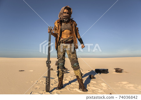 Post-apocalyptic Woman Outdoors in a Wasteland 74036842