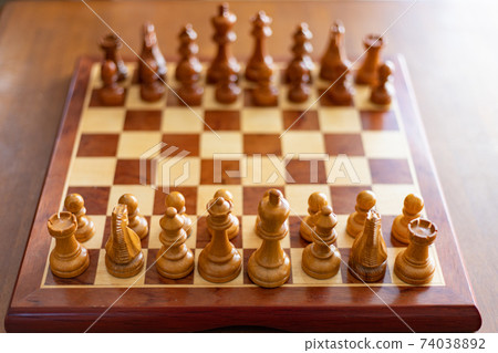 Chess board and chess pieces 74038892