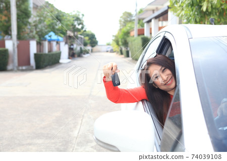 woman call and driving in car woman call and driving in car 74039108