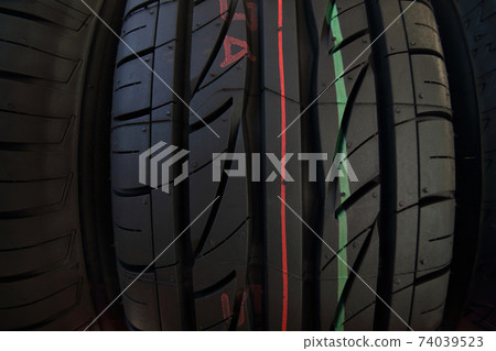 tires of car or vehicle standing in shop tires of car or vehicle standing in shop 74039523