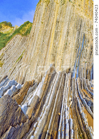 Steeply-tilted Layers of Flysch, Basque Coast UNESCO Global Geopark, Spain 74040423