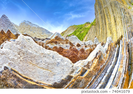 Steeply-tilted Layers of Flysch, Basque Coast UNESCO Global Geopark, Spain 74041079
