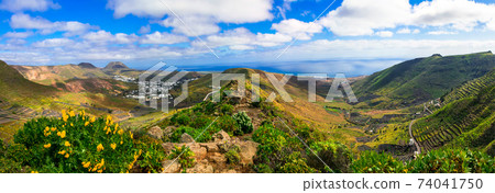 Lanzarote - impressive beauty of volcanic island.View of Haria village Lanzarote - impressive beauty of volcanic island.View of Haria village 74041750