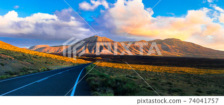 Travel in Lanzarote islands. Unique volcanic landscapes of Canary islands Travel in Lanzarote islands. Unique volcanic landscapes of Canary islands 74041757