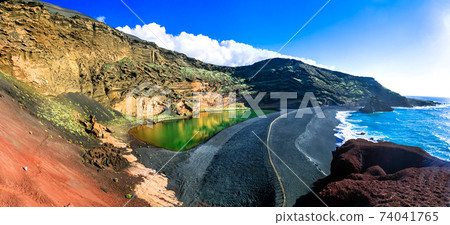 El Golfo with unique Lago Verde and black sands beach. Lanzarote, Canary islands El Golfo with unique Lago Verde and black sands beach. Lanzarote, Canary islands 74041765
