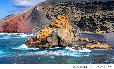 Volcanic island Lanzarote and beautiful colorful beaches. Canary islands Volcanic island Lanzarote and beautiful colorful beaches. Canary islands 74041766
