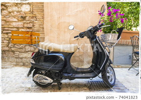 Vintage scooter - floral street decoration, artistic photo 74041823