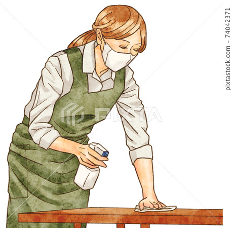 Woman disinfecting the table 1 Woman disinfecting the table 1 74042371