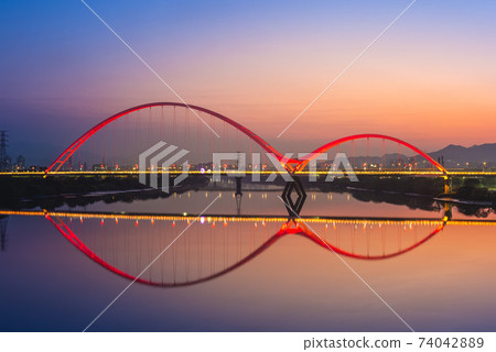 Night scene of New Taipei city by river in taiwan Night scene of New Taipei city by river in taiwan 74042889