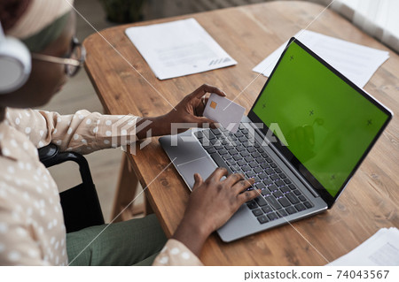 African American Woman paying Online African American Woman paying Online 74043567