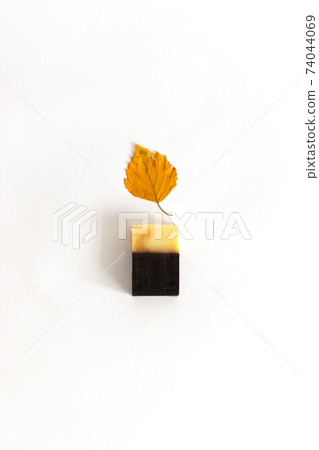 Tar soap for hand washing. Body care spa relaxation cleansing concept. Natural products. Purity Tar soap for hand washing. Body care spa relaxation cleansing concept. Natural products. Purity 74044069