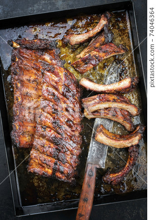 Barbecue spare ribs St Louis cut with hot honey chili  74046364