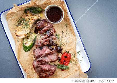 barbecue sliced rostbraten with fried mushrooms and paprika barbecue sliced rostbraten with fried mushrooms and paprika 74046377