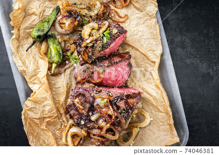 barbecue sliced rostbraten with fried mushrooms and paprika  74046381