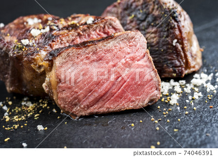 Traditional barbecue dry aged wagyu roast beef sliced  74046391