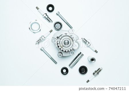 Accessories for cars. Set of new metal car part. Auto motor mechanic spare or automotive piece isolated on white background. Automobile engine service with space for text. 74047211