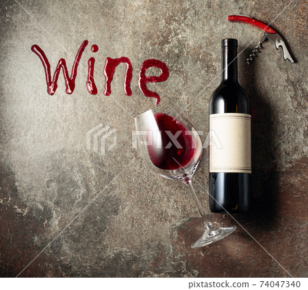 Red wine on an old rough background. 74047340