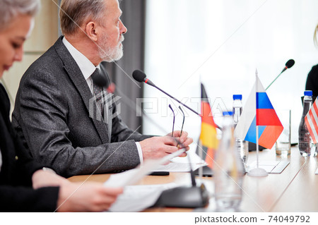 group of european executive people discussing plan for future at modern startup office building group of european executive people discussing plan for future at modern startup office building 74049792