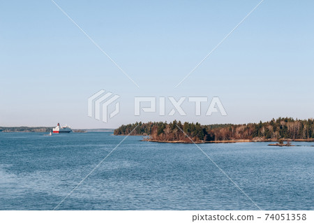 Spring Baltic sea landscape, regular spring cruise between Tallinn and Stockholm. Local tourism concept, spring nature, selective focus Spring Baltic sea landscape, regular spring cruise between Tallinn and Stockholm. Local tourism concept, spring nature, selective focus 74051358