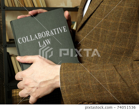 Collaborative law is in the hands of a lawyer in a jacket. Collaborative law is in the hands of a lawyer in a jacket. 74051536