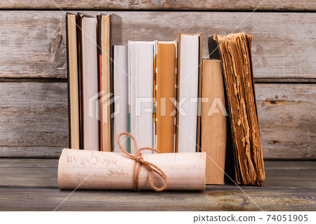 Collection of old books and scroll. Collection of old books and scroll. 74051905