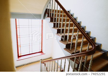 a photo of an old building staircase view 74052291