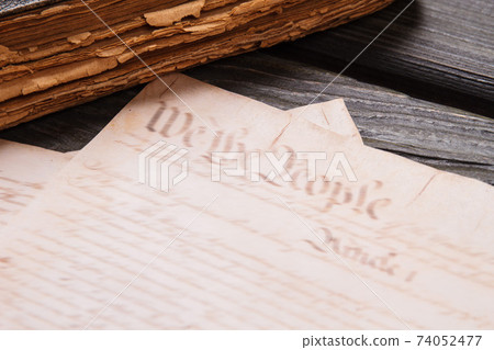 Close-up old ancient book and papers. Close-up old ancient book and papers. 74052477