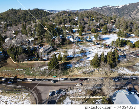 Aerial view of historic Downtown City of Julian during snow day. Aerial view of historic Downtown City of Julian during snow day. 74054358