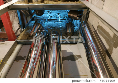 Wiring and installation of a chimney in a newly built house. 74054506