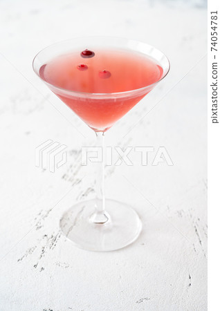Glass of Cosmopolitan cocktail 74054781