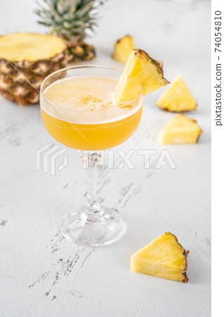 Glass of Algonquin cocktail 74054810