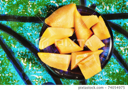 Orange melon fruit 74054975