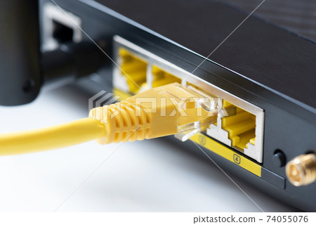 Router Wi-Fi close up. Fast internet modem device. Router Wi-Fi close up. Fast internet modem device. 74055076