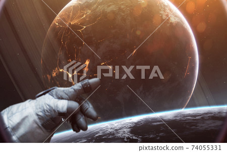 Brave astronaut spacewalking at the alien planet orbit. People in space. Elements of this image furnished by NASA 74055331