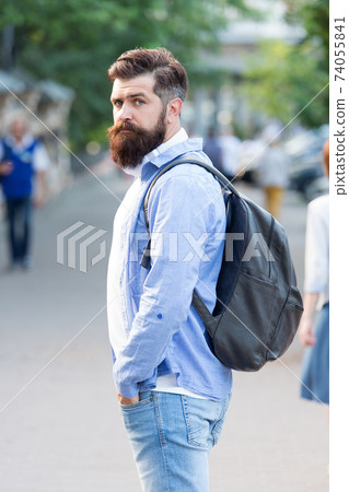Modern rest. Bearded man travel. Guy exploring city.  74055841