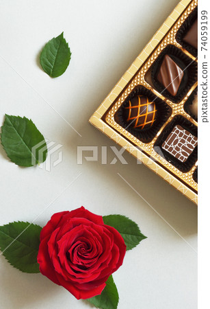 Roses and chocolate. Valentine, sweets, chocolate, cacao, etc. 74059199