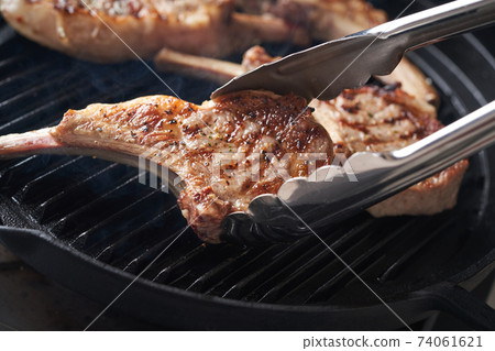 Bake lamb chops in a grill pan Bake lamb chops in a grill pan 74061621