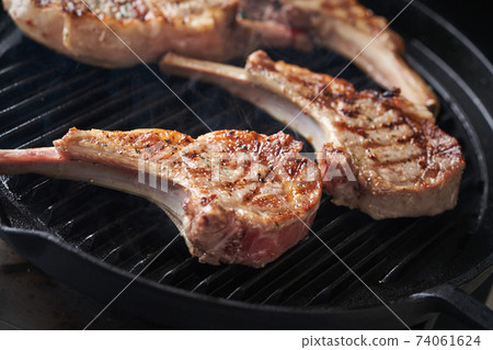 Bake lamb chops in a grill pan Bake lamb chops in a grill pan 74061624