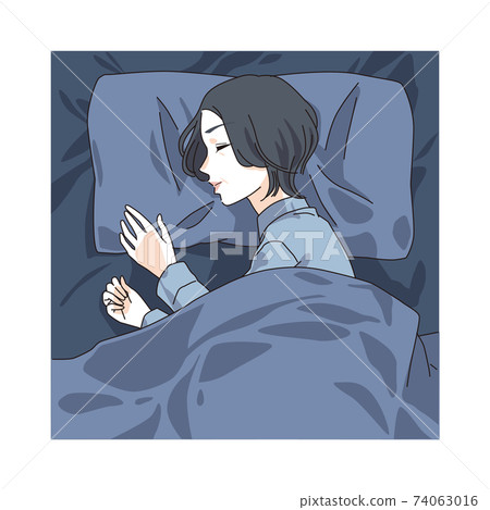 Woman in her 40s sleeping in bed 74063016