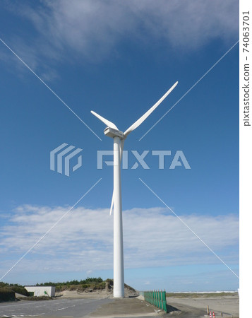 Provera type wind turbine for wind power generation that turns magnificently on the Hasaki coast in Ibaraki prefecture under the clear blue sky in summer Provera type wind turbine for wind power generation that turns magnificently on the Hasaki coast in Ibaraki prefecture under the clear blue sky in summer 74063701