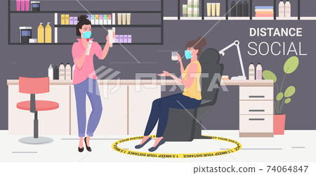 hairdresser with client in masks discussing during meeting keeping distance to prevent coronavirus pandemic hairdresser with client in masks discussing during meeting keeping distance to prevent coronavirus pandemic 74064847