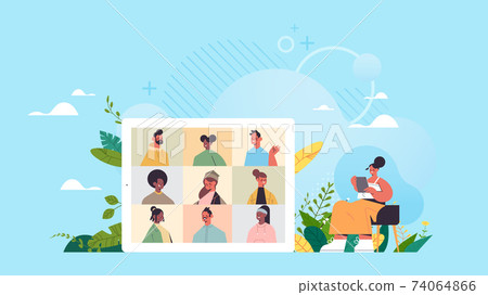woman chatting with mix race colleagues during video call online conference virtual meeting communication woman chatting with mix race colleagues during video call online conference virtual meeting communication 74064866