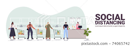 cutomers in protective masks in queue at cash desk keeping distance to prevent coronavirus social distancing 74065742