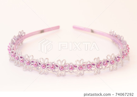 Beautiful pink silver hair band isolated on white background 74067292