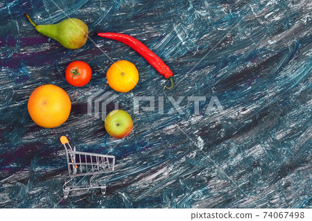 buying healthy vegetables and fruits concept on a dark background top view. Copy space buying healthy vegetables and fruits concept on a dark background top view. Copy space 74067498