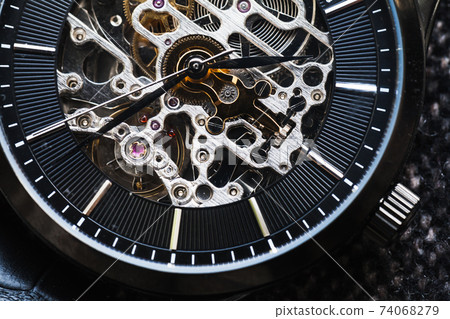 Skeleton watch close-up photo 74068279